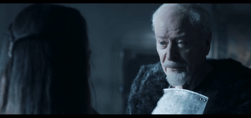 Michael Caine with Sophie Lowe in Medieval the film.